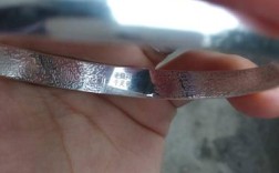 999纯银产品上面没有钢印正常吗？银色笔记本没有标志